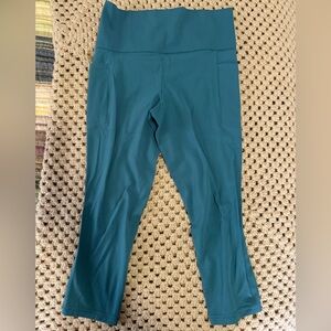 Athleta High-Waist Teal Athletic Leggings with Side Pockets